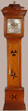 A slender, well proportioned, mid18th C, 8 day, brass dial,stellar inlaid, oak longcase clock with detachable caddy top signed W. ( William ) Womersly fecit.No place name but known to have been working in Halifax 1785.