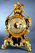 c.1745 Silver-Gilt, Gilt-Wood, and Painted Grand Sonnerie Mantel Clock with Swinging Jester and Universal Dial, Joseph Graff, Prague.
